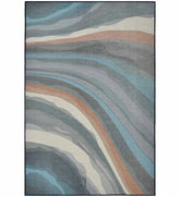 Neutral wave earth tone abstract rug in beige and taupe.